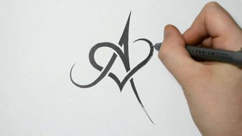 Tatuajes de nombres con plumas 13